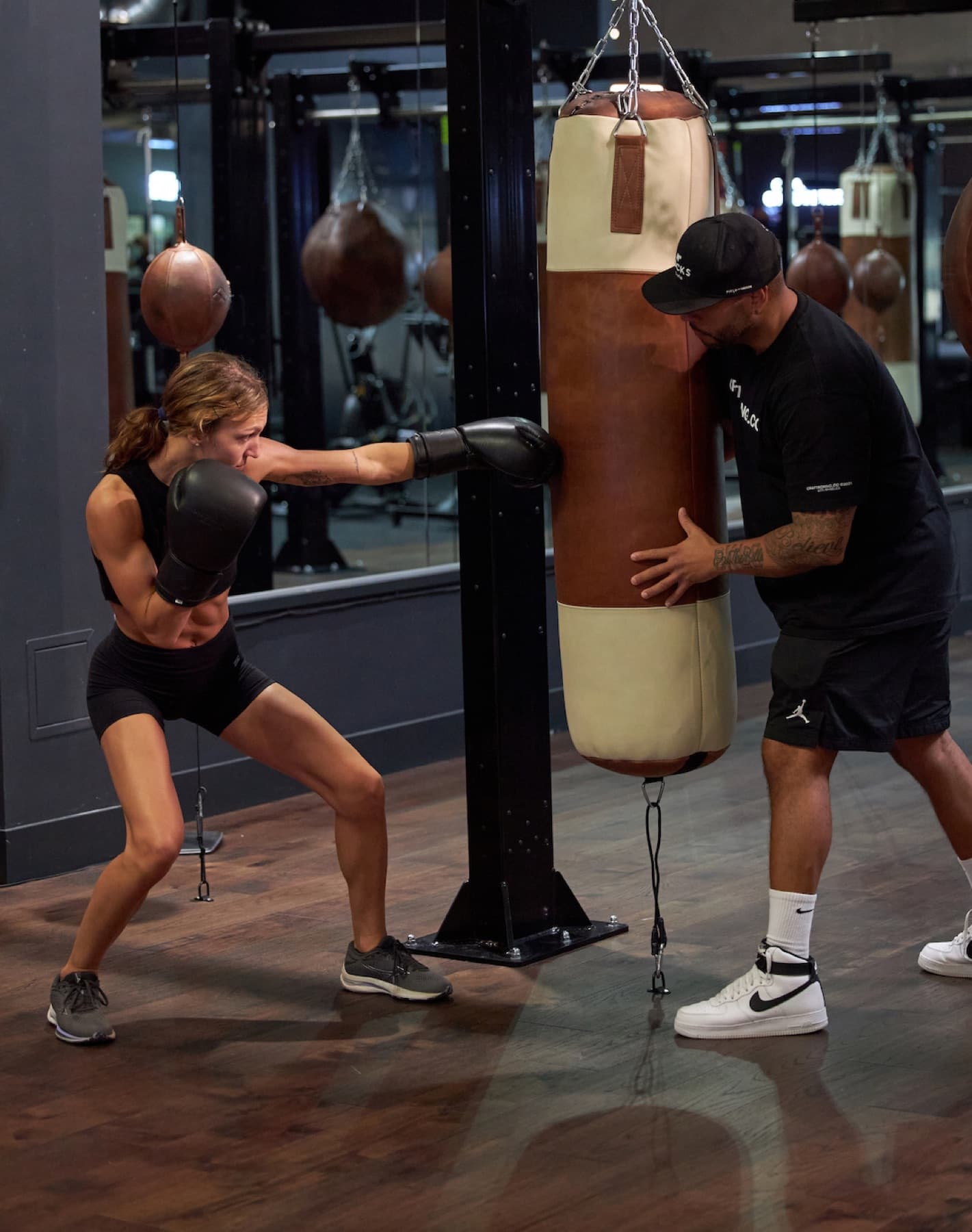 Member working the heavy bag